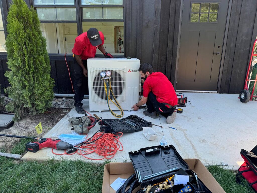 Big Red Plumbing professional checking residential heating system